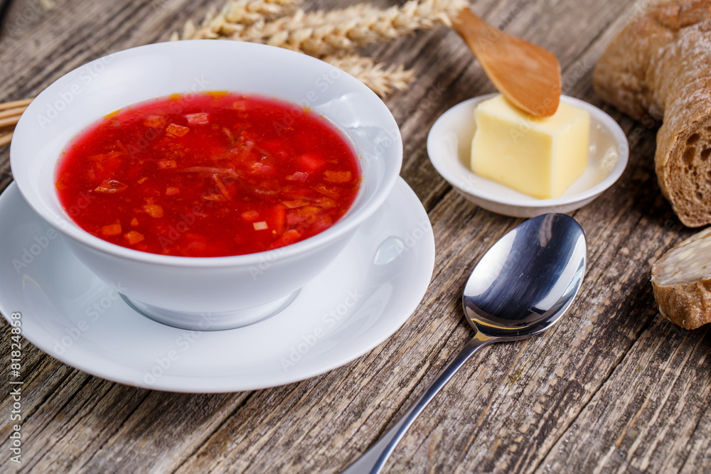Tasty soup with bread on a wooden background. Tasty soup with bread on a wooden background.