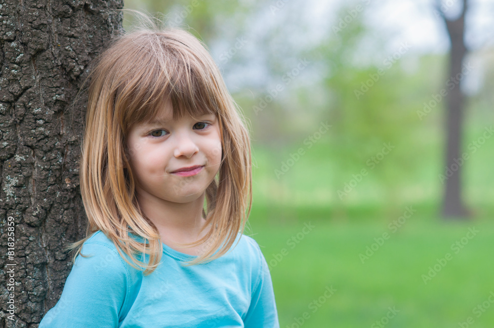 Cute little blonde girl having fun in nature on beautiful spring Cute little blonde girl having fun in nature on beautiful spring