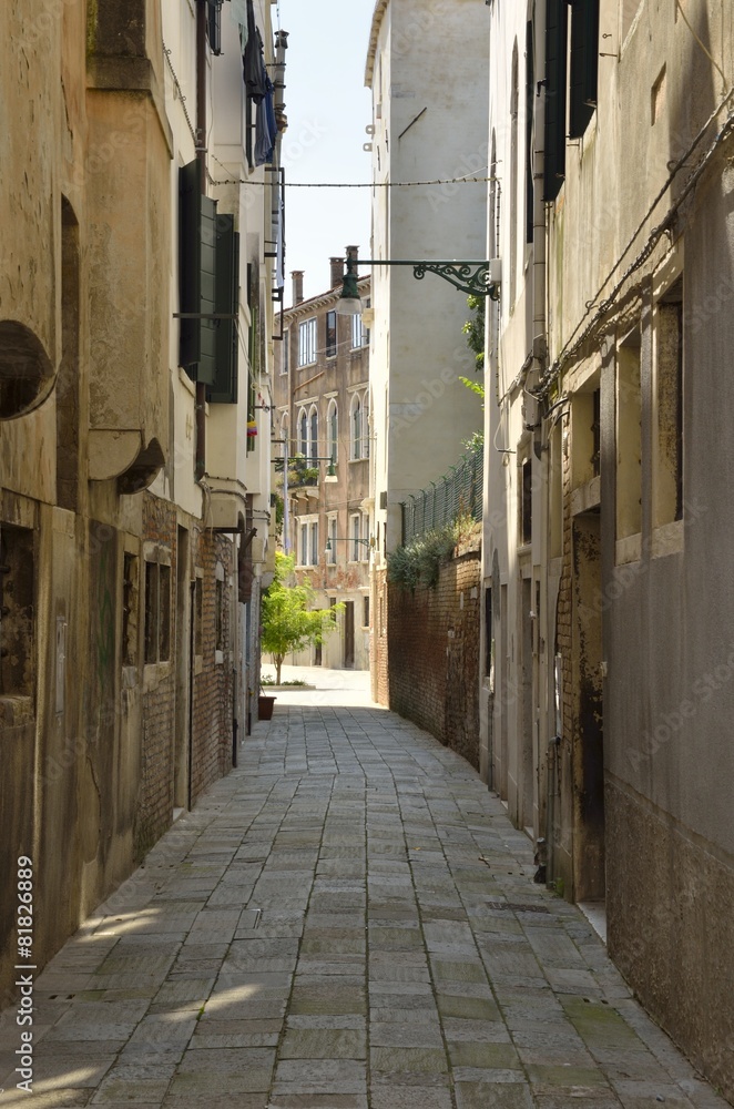 Fototapeta premium Narrow street in Venice, Italy