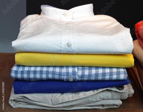 Stack of clean modern clothes