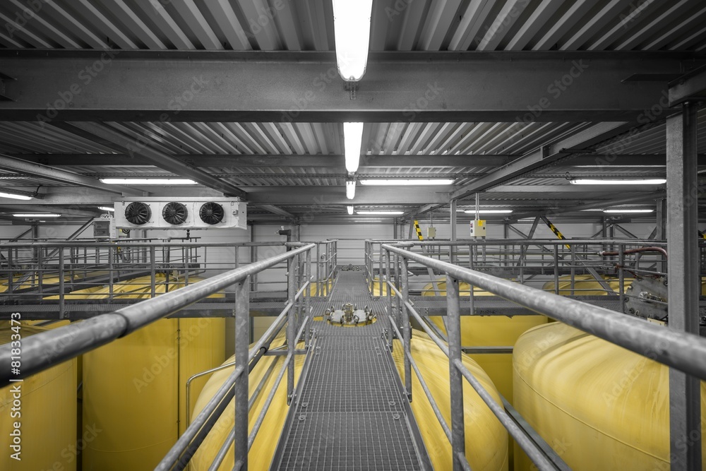 Fototapeta premium Industrial interior with welded silos