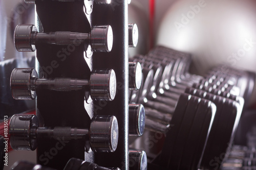 Gym equipment. Sport background. Dumbbell. Copy space