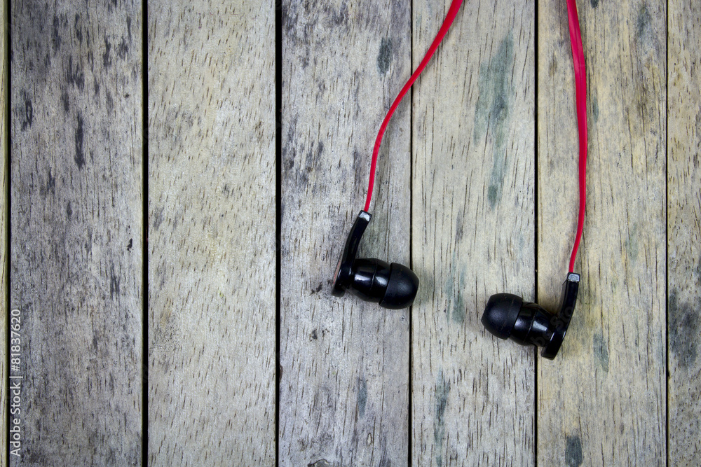 earphones put on wood plank, life style background
