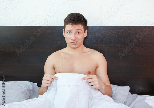 Impotent man worrying about his penis and erection failure