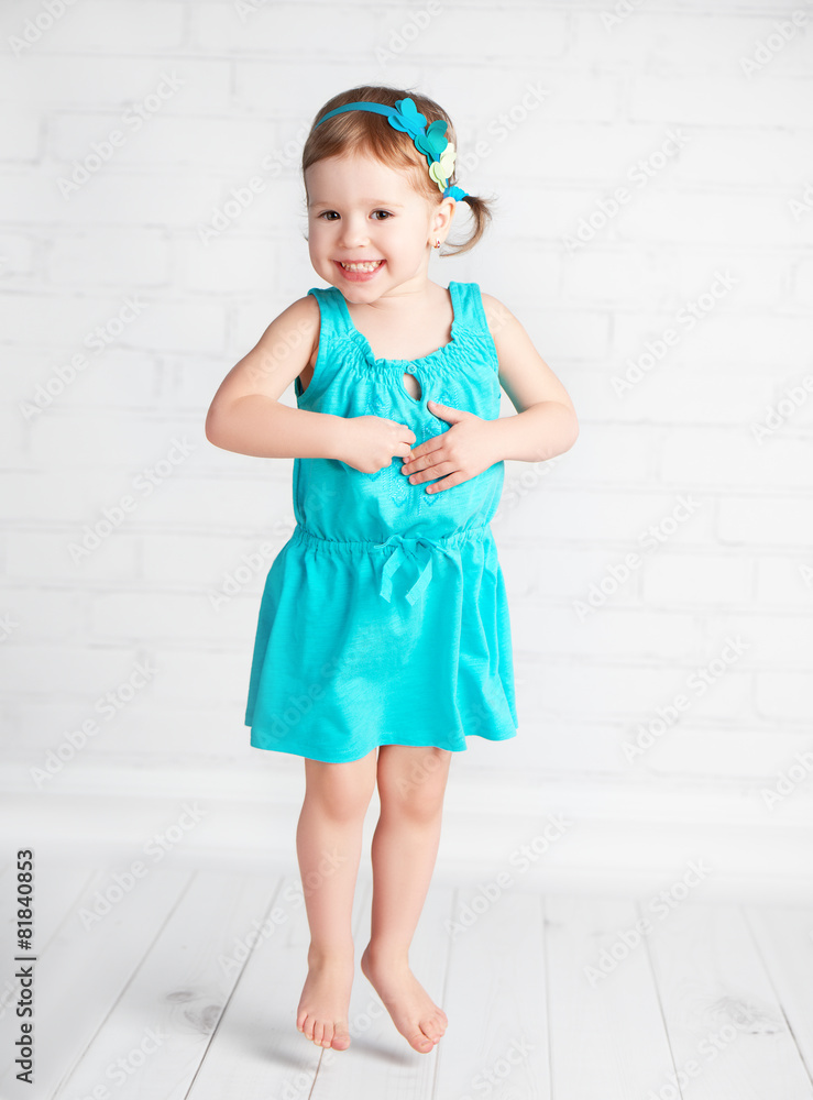 happy child little girl jumping for joy happy child little girl jumping for joy