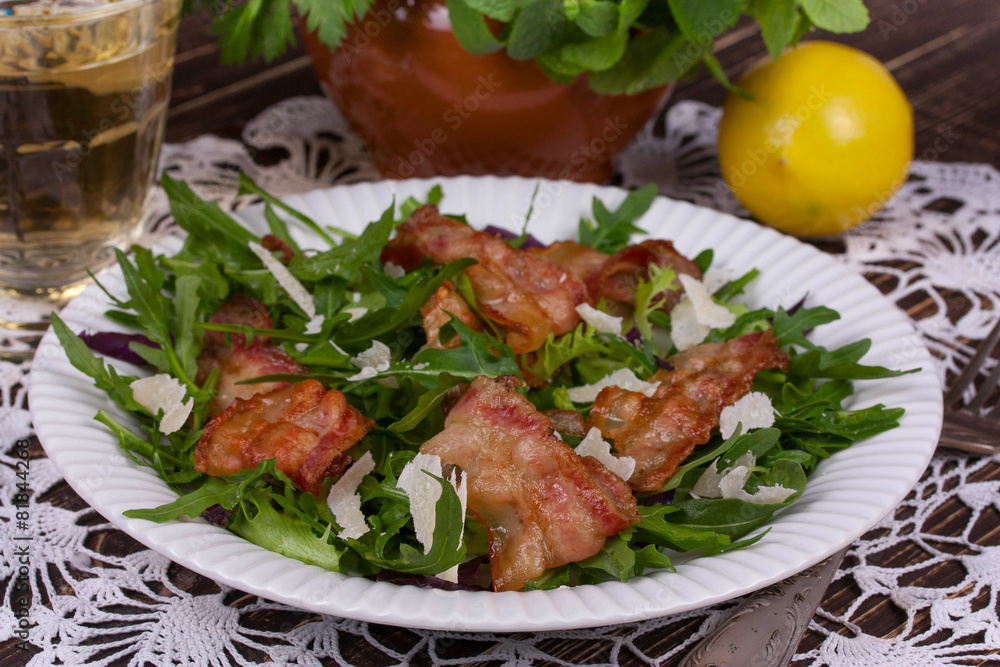 Grilled bacon with parmesan cheese and arugula