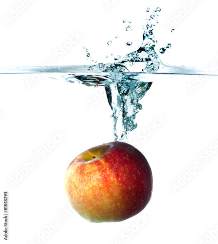 Apple dropping into water