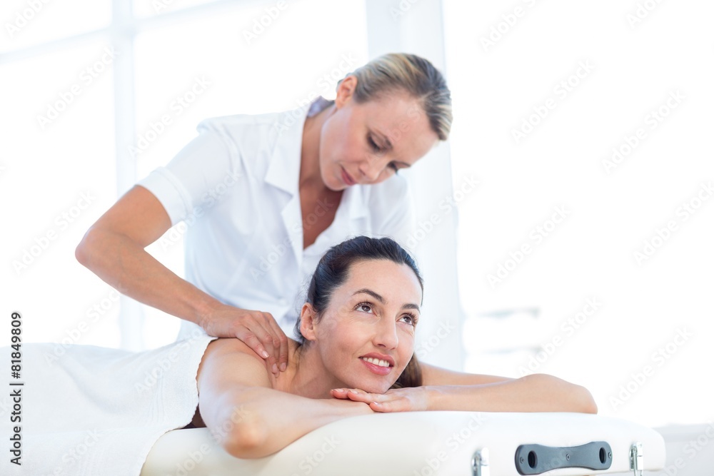 Woman having back massage Woman having back massage