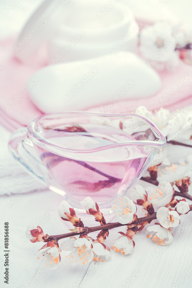 still life of sea salt and essential oils and apricot flowers still life of sea salt and essential oils and apricot flowers