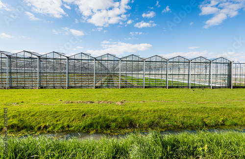 Modern and transparent greenhouse on the outside
