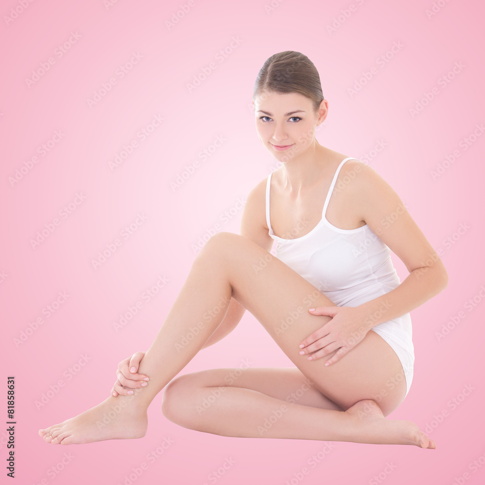 Fototapeta premium young beautiful slim sexy woman in cotton underwear sitting over