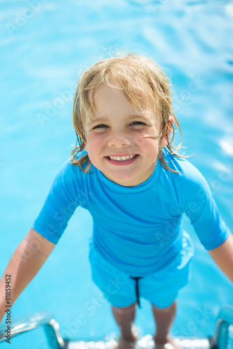 Happy little boy  in the swimming pool © oksanatrautwein
