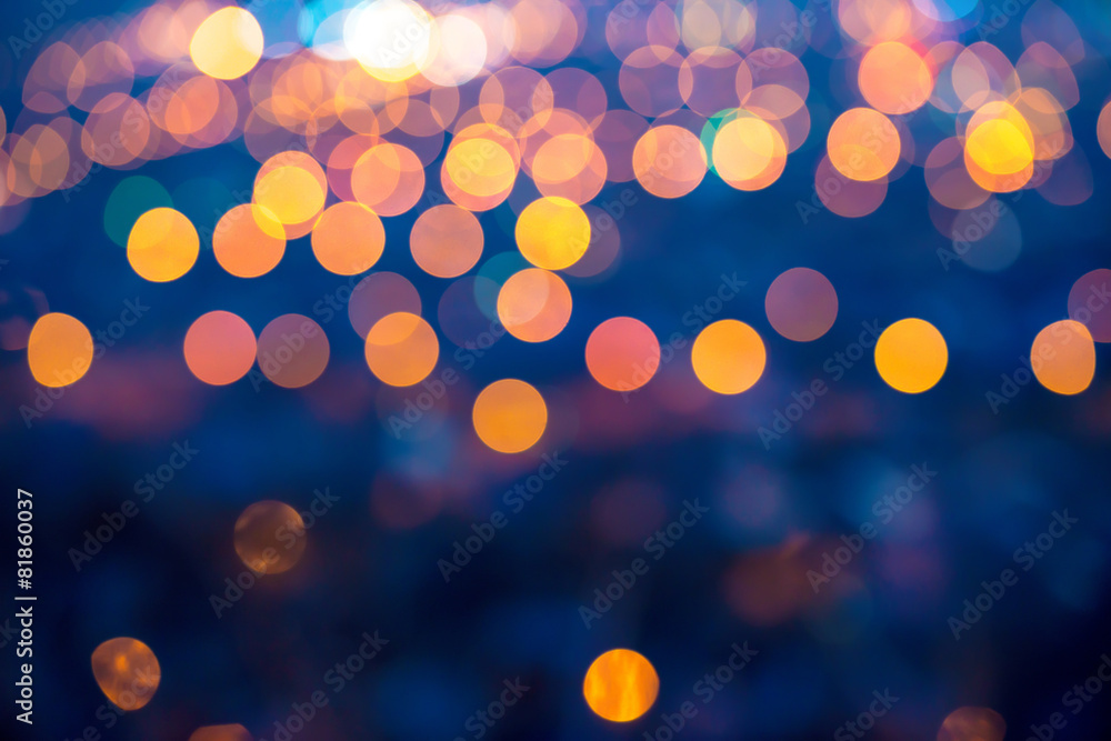 Obraz premium merry christmas lights abstract circular bokeh on blue backgroun