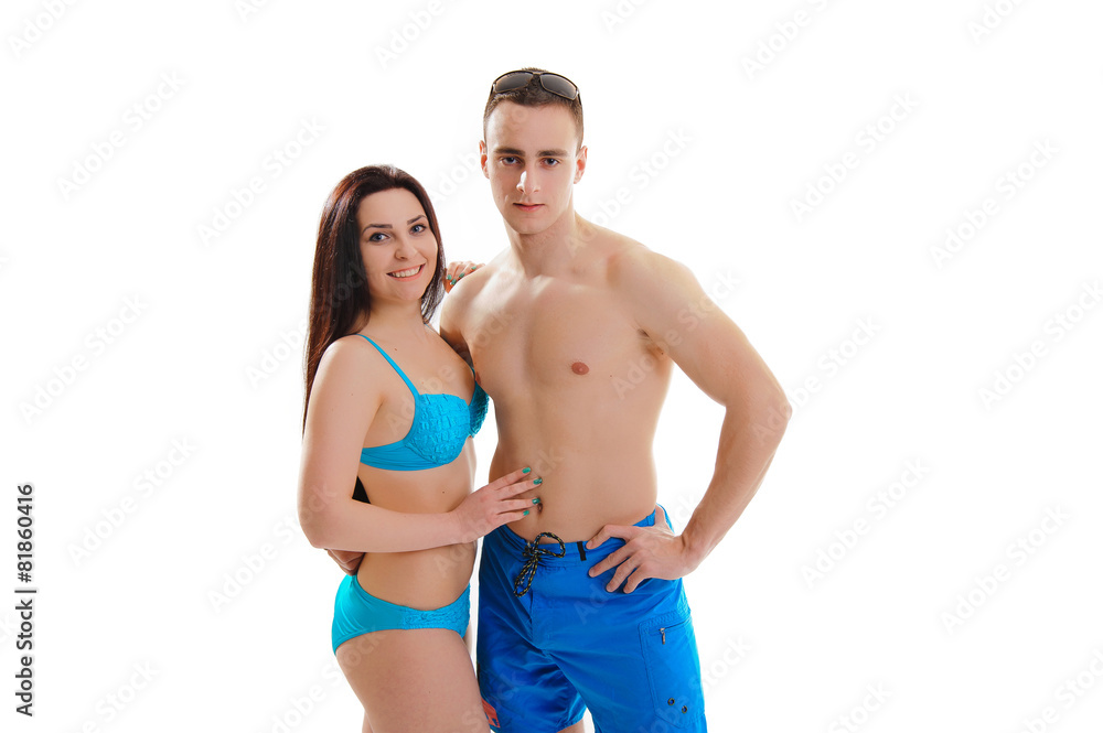 Loving couple in swimwear isolated on white background Loving couple in swimwear isolated on white background
