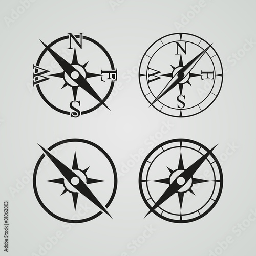 Vector icons depicting four different compasses