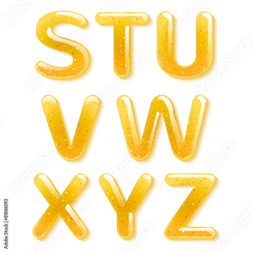 Yellow honey jelly alphabet. Glossy letters.