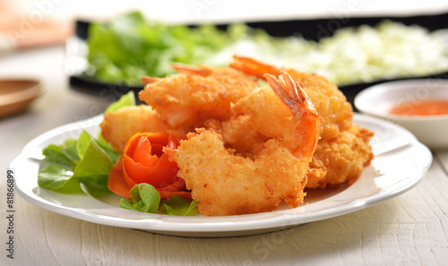 Fried Shrimp with vegetable on white plate