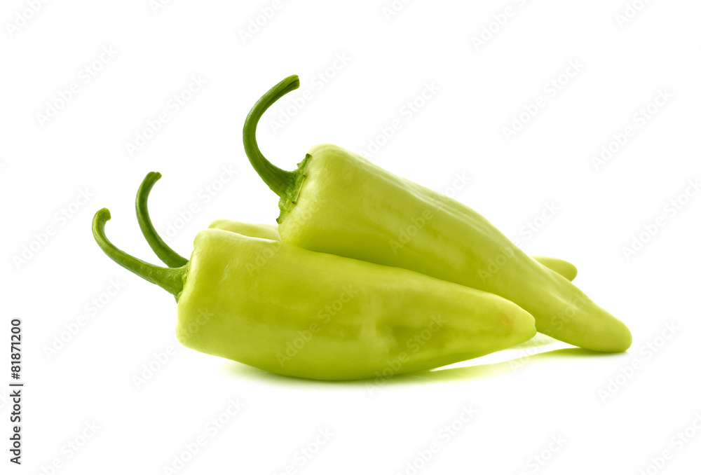 green chili peppers with stem on white background green chili peppers with stem on white background