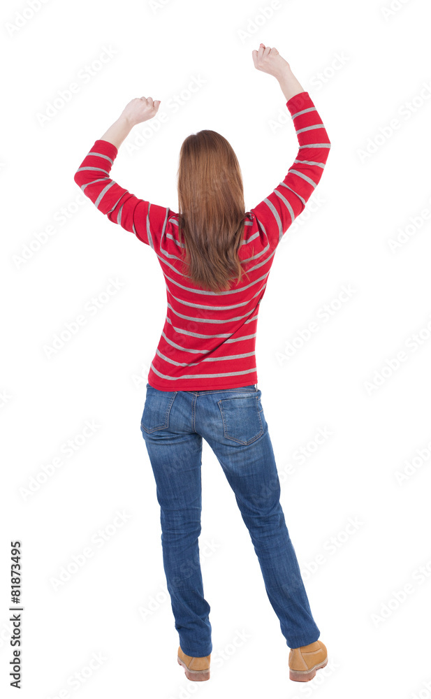 back view of dancing young beautiful woman. back view of dancing young beautiful woman.