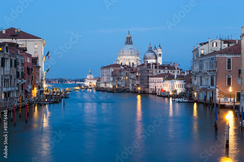 Grand Canal and Santa Maria della Salute at night in Venice.