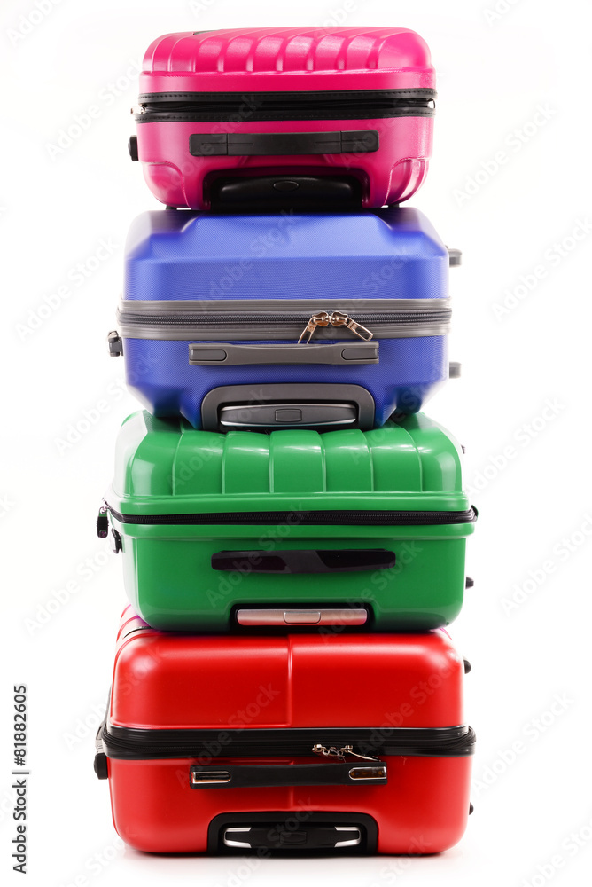 Stack of plastic suitcases isolated on white Stack of plastic suitcases isolated on white