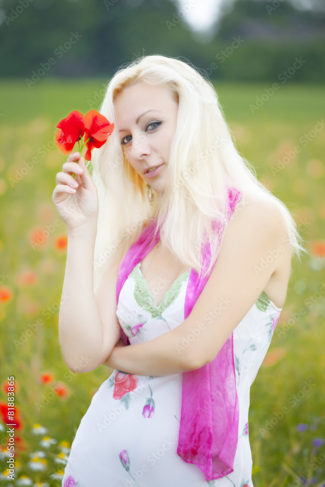 young woman on the summer field young woman on the summer field