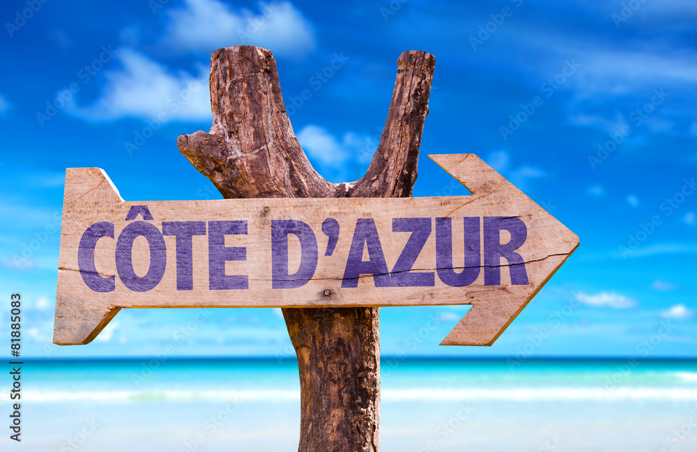 Cote D'Azur wooden sign with beach background