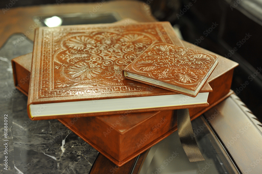 Fototapeta premium brown leather wedding photo book album