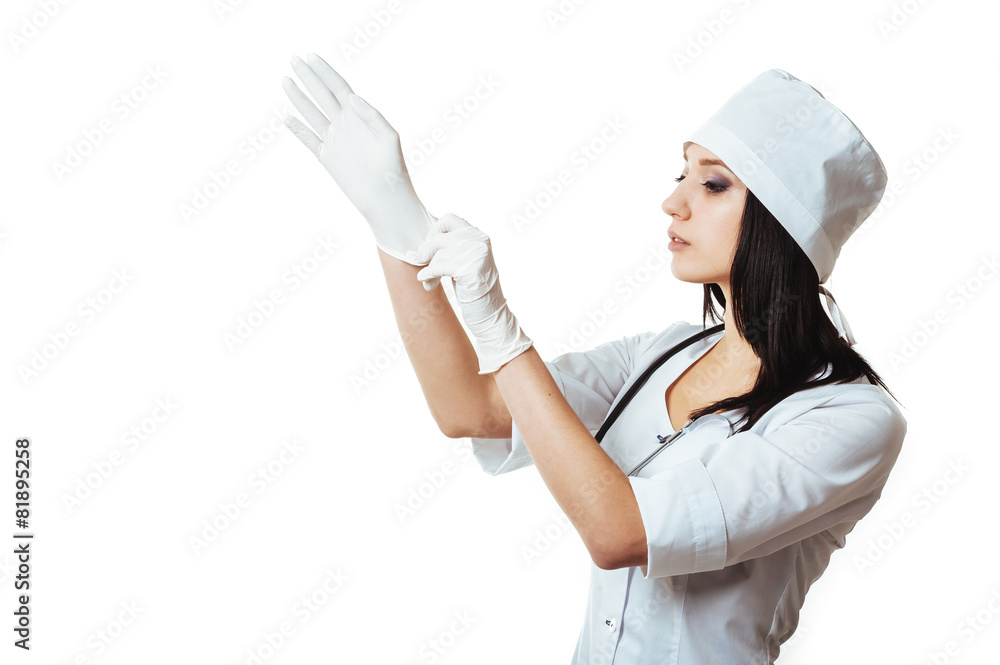 Doctor putting on white sterilized medical glove for making Doctor putting on white sterilized medical glove for making