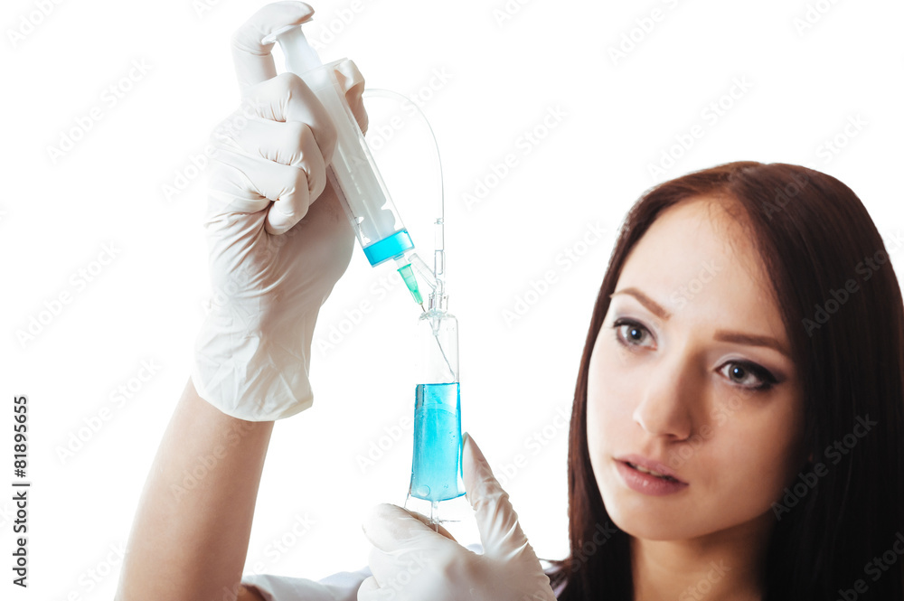 Fototapeta premium Young brunette doctor woman with syringe isolated on white