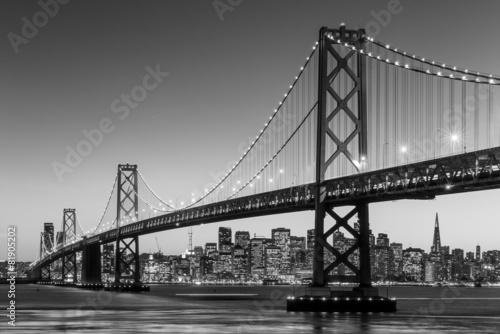 San Francisco skyline and Bay Bridge at sunset, California #81905202