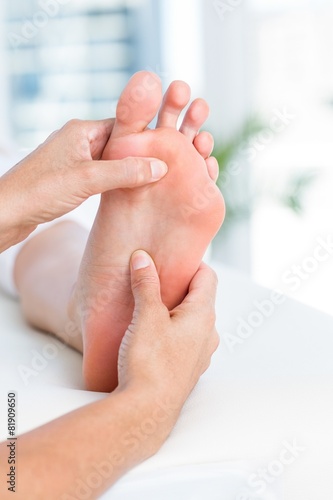 Physiotherapist massaging her patients foot © WavebreakmediaMicro