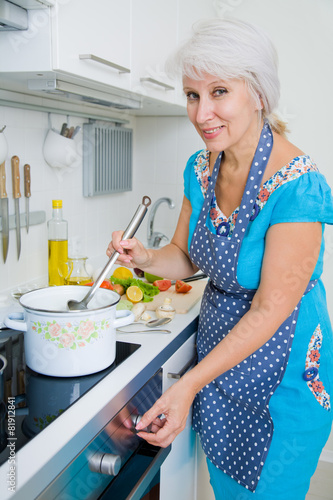 Mature woman on the kitchen