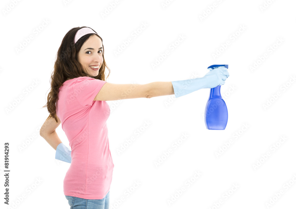 Spring cleaning woman spraying with a detergent Spring cleaning woman spraying with a detergent