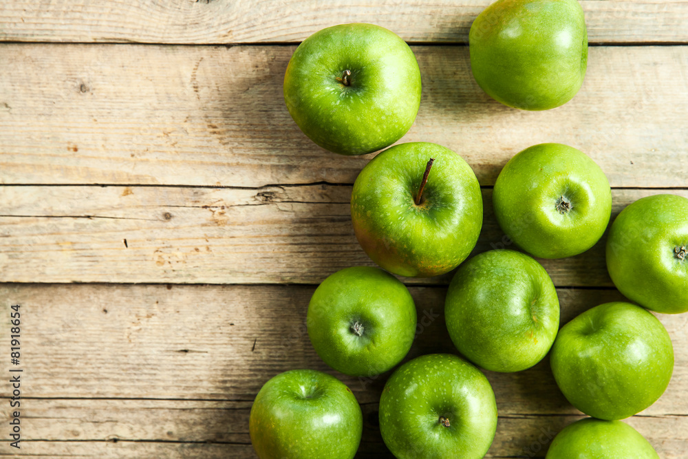 fruit. Ripe green apples on wooden background fruit. Ripe green apples on wooden background