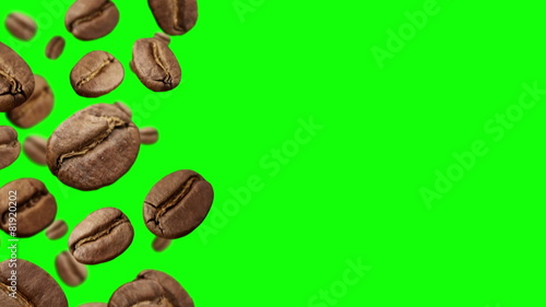 Coffee Beans falling down on green background