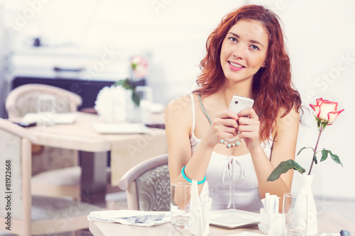 Texting massages at cafe