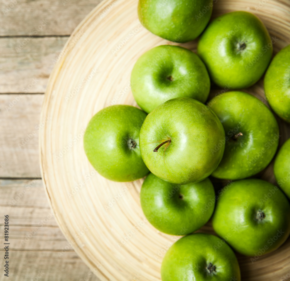 fruit. apples in a bowl on wooden background fruit. apples in a bowl on wooden background