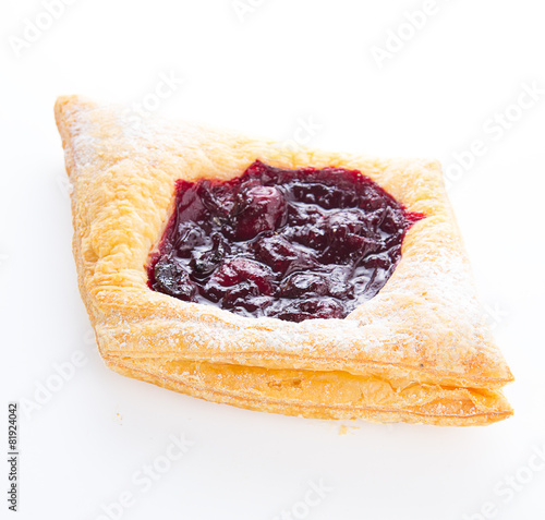 Delicious Cherry puff pastry isolated on white background photo