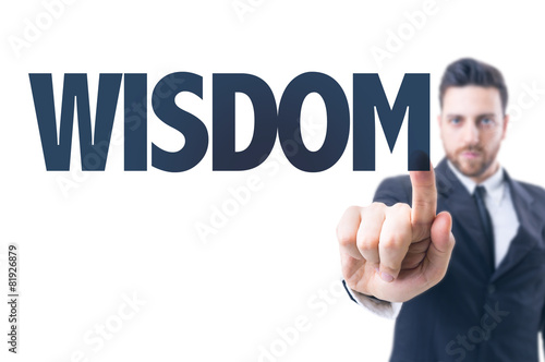 Business man pointing the text: Wisdom