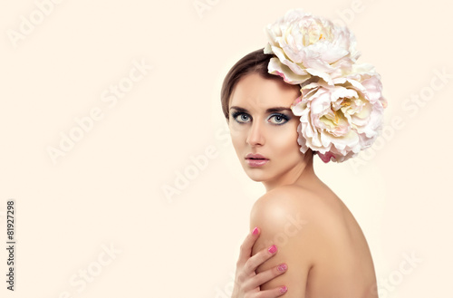 Beauty Young Woman Model with Flower in her Hair.  Skincare © av88