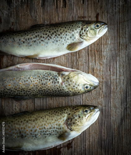 rainbow trout on wooden background