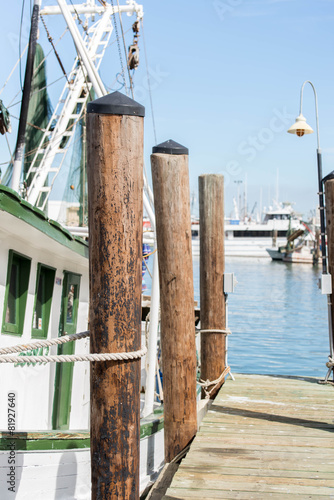 commercial fishing boats at the ocean marina docks photo