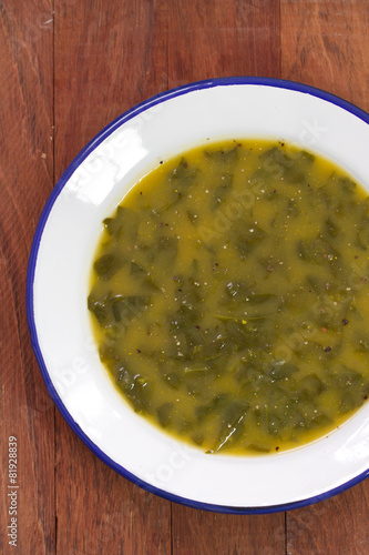 vegetable soup in plate photo