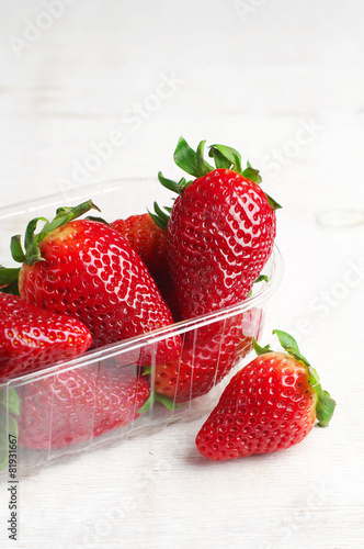 Ripe strawberries in plastic packing