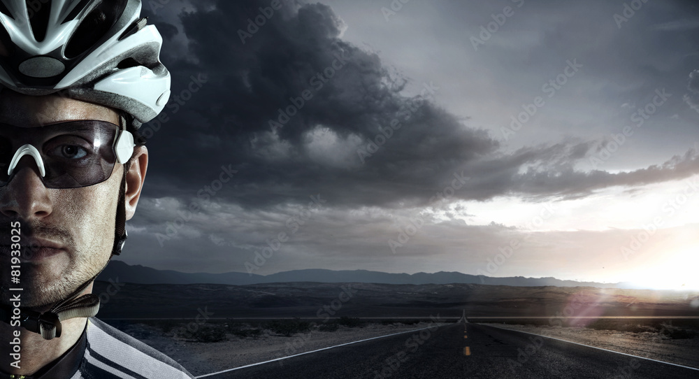 Naklejka premium Cyclist. Dramatic close-up portrait