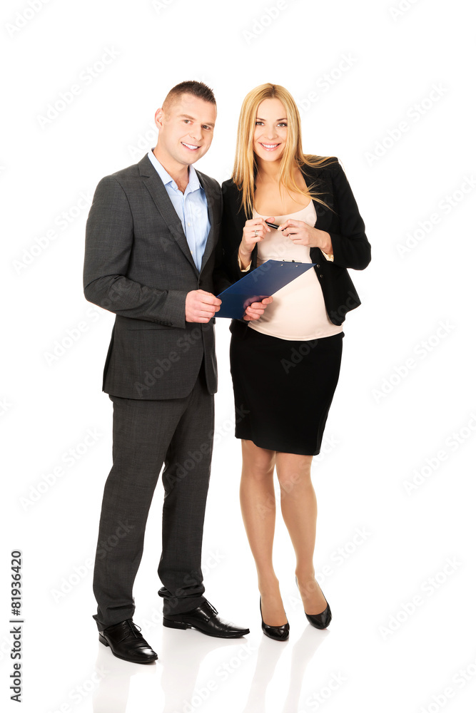 Pregnant businesswoman with her partner