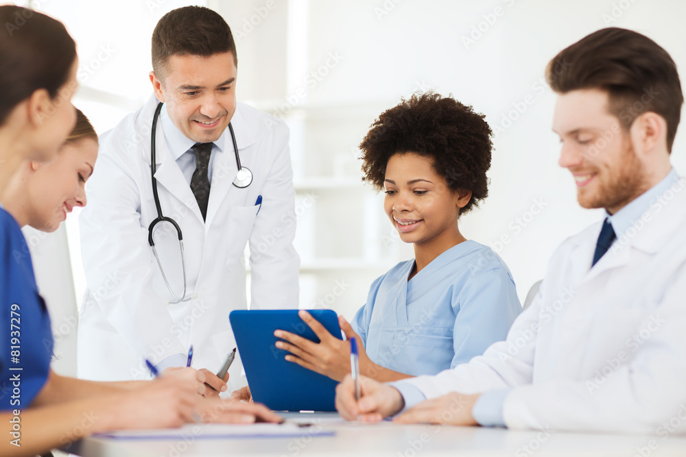 group of happy doctors meeting at hospital office group of happy doctors meeting at hospital office