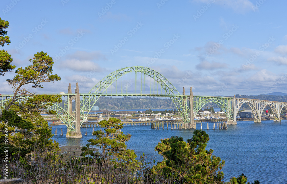 Yaquina Bay Bridge located in Newport, Oregon. Yaquina Bay Bridge located in Newport, Oregon.
