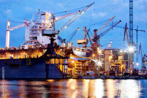 Tablou canvas Shipyard at work, ship repair, freight. Industrial